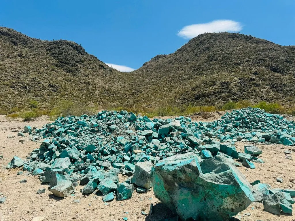 Piles of copper ore in a desert quarry